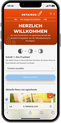 Ein Smartphone mit Website-Inhalten der hetairos Seite